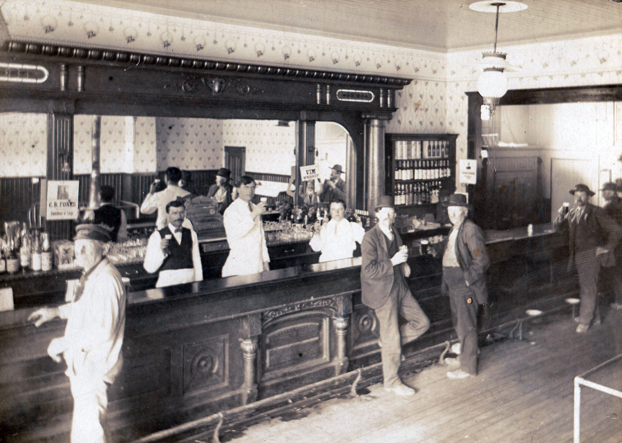 The Ludwig Miller Saloon circa 1913. The tall man behind the bar is Henry Yost and the shorter bartender with a mustache is believed to be John Repp. The young man standing to the right behind the bar is likely to be Ludwig Miller's son, Henry Miller. Photograph courtesy of Shanna Minarik.