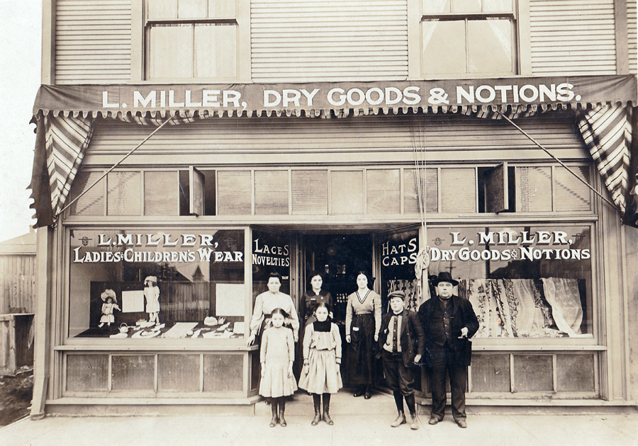 The Ludwig Miller family portrait in front of the L. Miller Dry Goods & Notions store circa 1908. Back row from left to right: Katherine, Christina and Elizabeth. Front row from left to right: Anna Maria, Mary, Henry and Ludwig. Photograph courtesy of Shanna Minarik.
