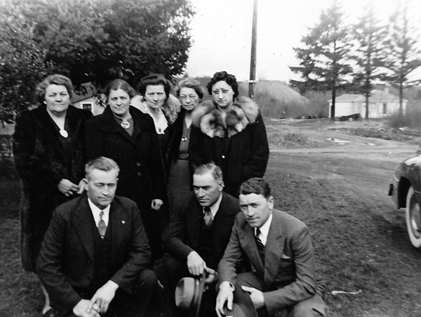 Conrad Bauer's children at his funeral. Back row from left to right: Beth, Pauline, Clara, Freda, Louise. Front row from left to right: John, Leo and Al. Photograph courtesy of Shanna Minarik.