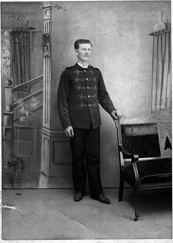 This portrait photograph taken in Russia is believed to show Adam Hergert, Sr. in a military uniform. Courtesy of Dick Hergert.