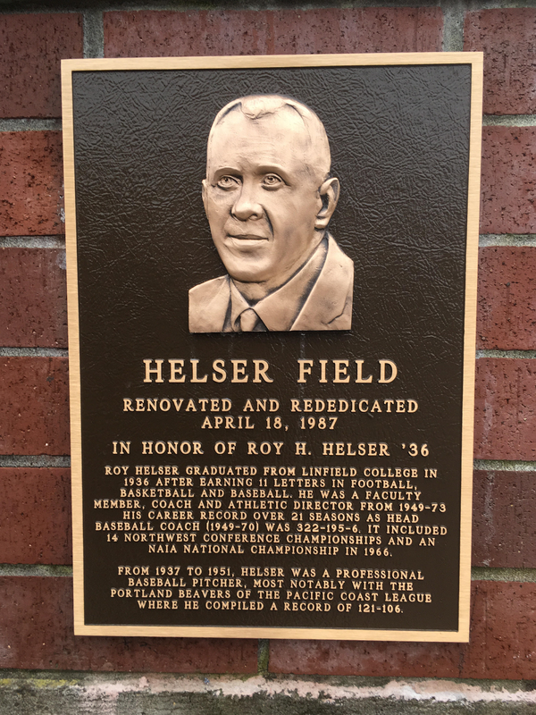 Plaque dedicating the Linfield baseball field to Roy Helser. 