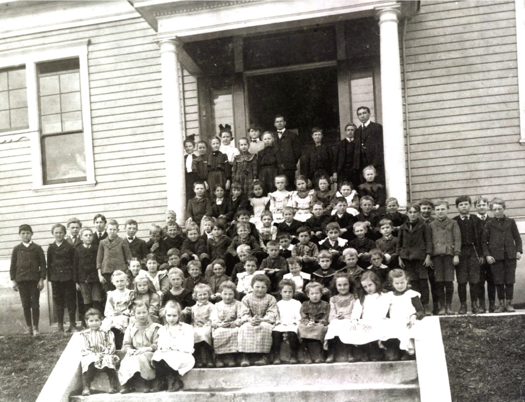 Class photograph possibly taken at the first Albina Homestead School.